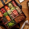 🍣 The $800 Sushi Box, BTC Battle Royale, and a Retro Cyberpunk Game